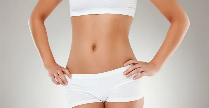 Contoured slim waistline achievable with SculpSure or CoolSculpting body contouring