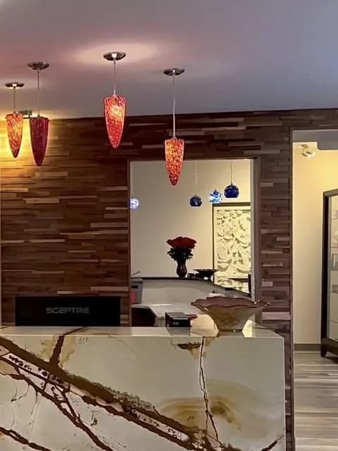 The reception desk and pendant lights at our Cincinnati practice