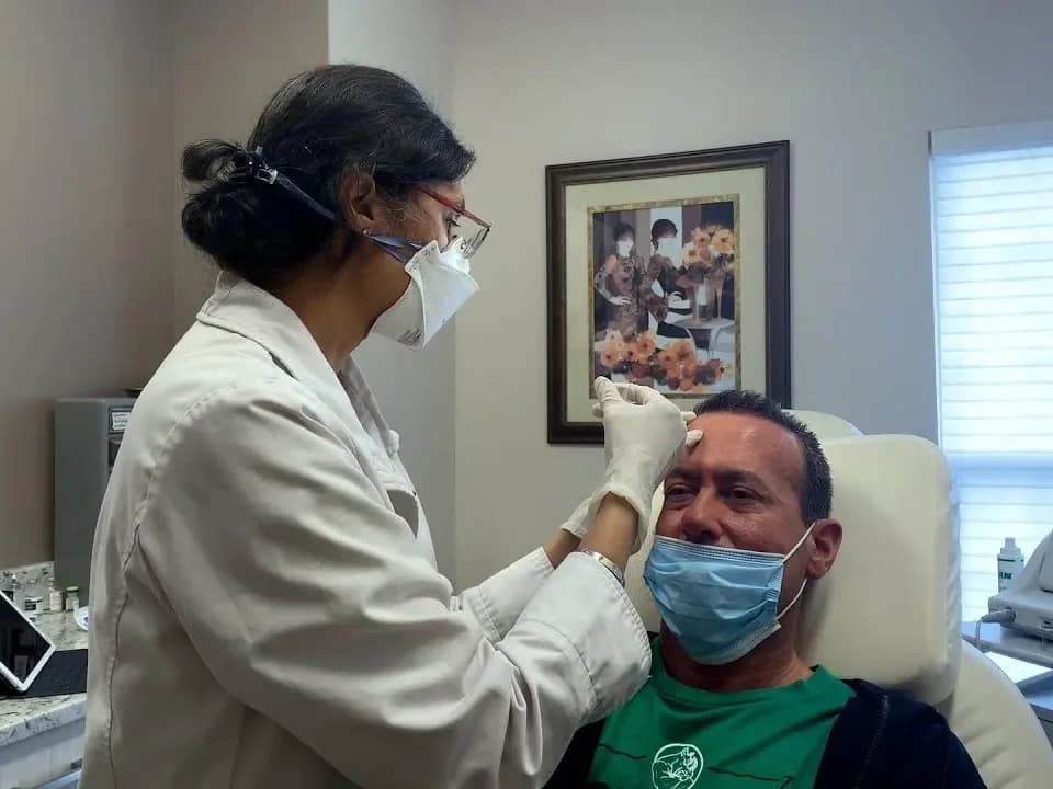 Dr. Shalini Gupta treating a patient at the Montgomery Road office