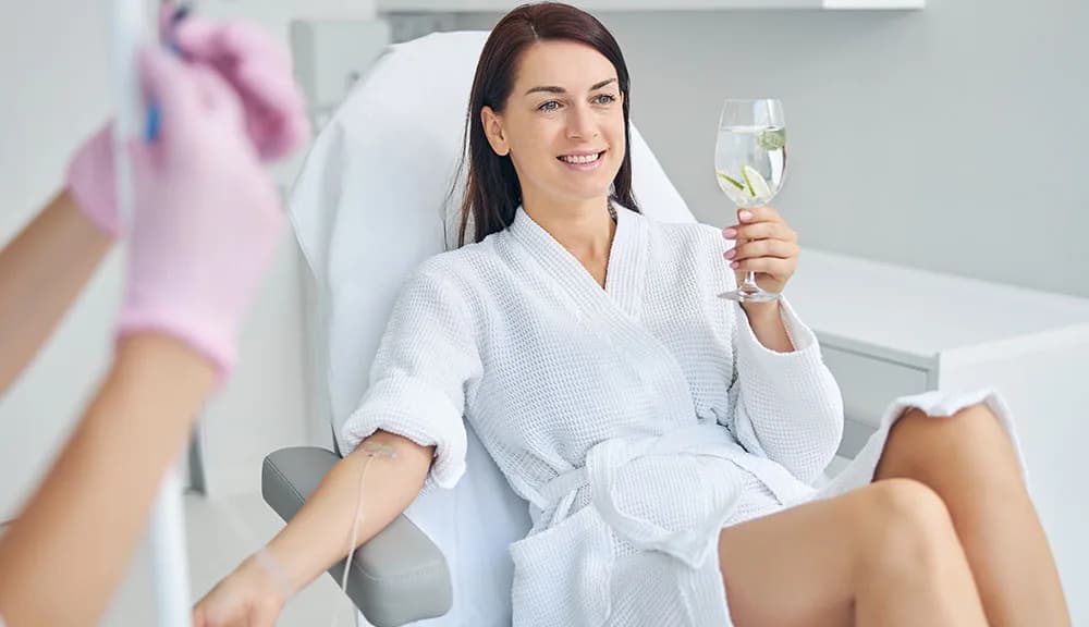 Patient relaxing in a treatment chair during a wellness visit